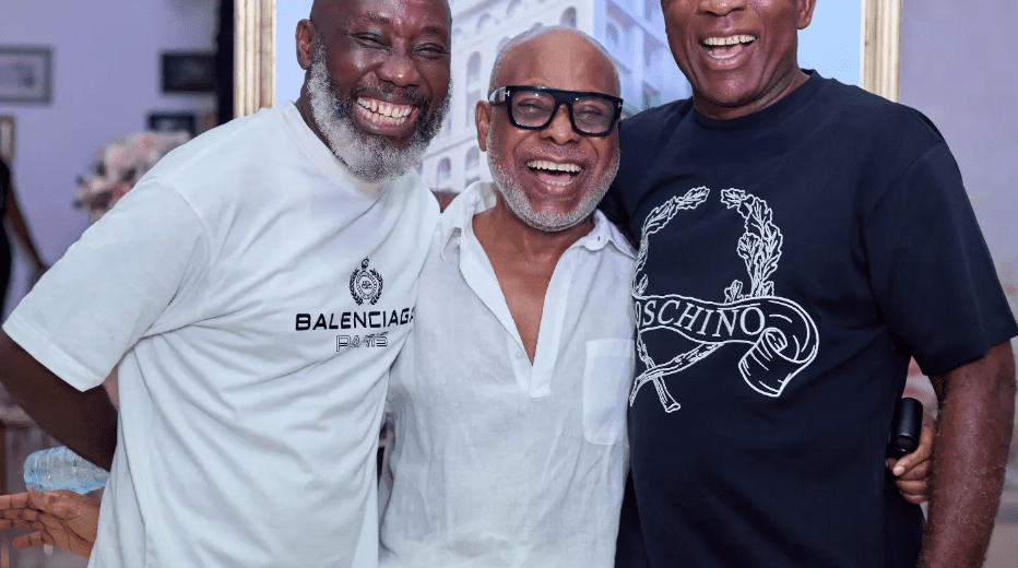 ola Ogunlesi standing with companions at a relaxed Lagos gathering, showcasing timeless elegance, youthful energy, and quiet influence among Nigeria’s business elite