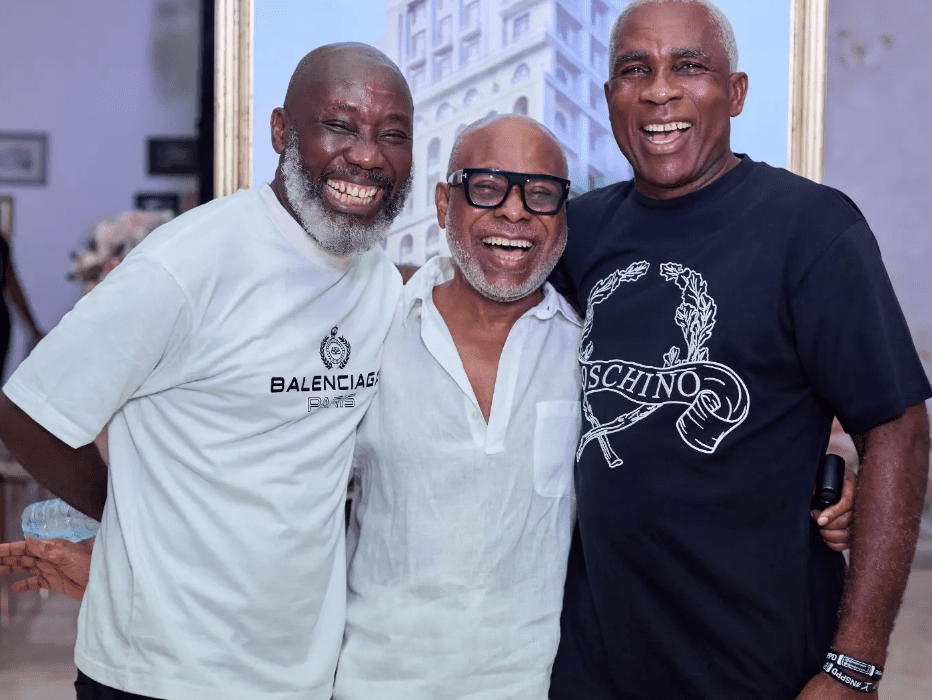 ola Ogunlesi standing with companions at a relaxed Lagos gathering, showcasing timeless elegance, youthful energy, and quiet influence among Nigeria’s business elite