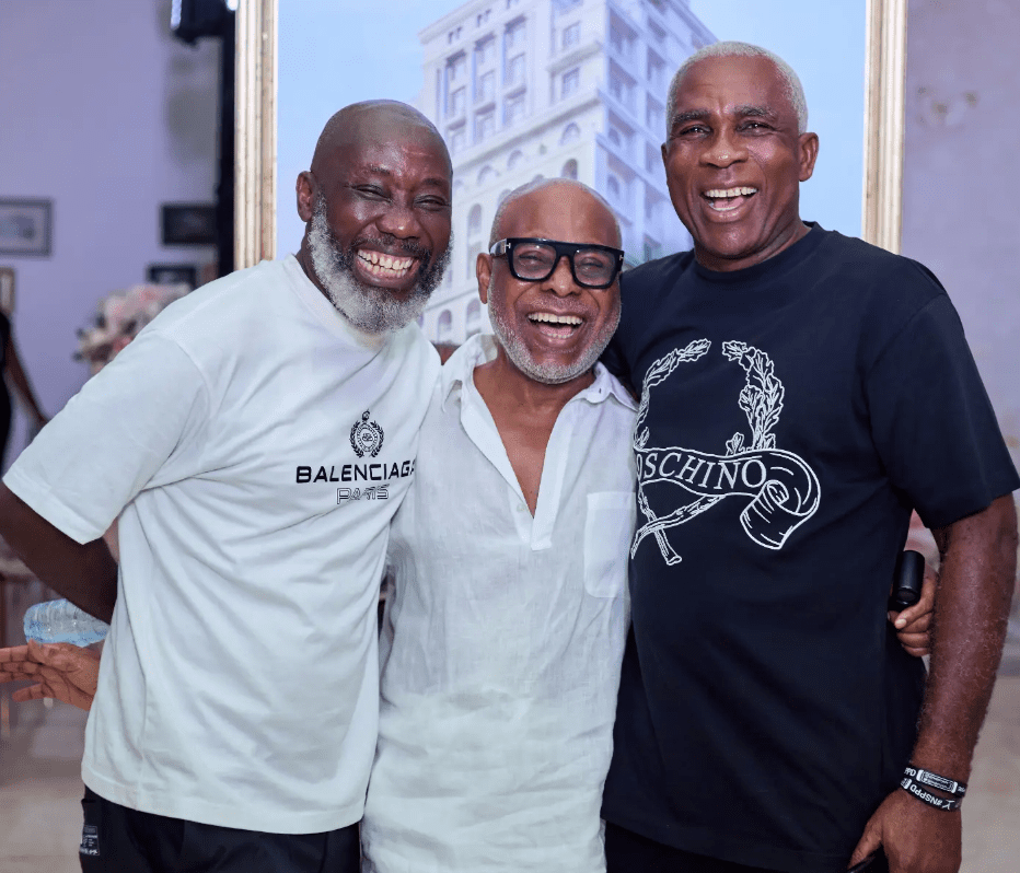 ola Ogunlesi standing with companions at a relaxed Lagos gathering, showcasing timeless elegance, youthful energy, and quiet influence among Nigeria’s business elite